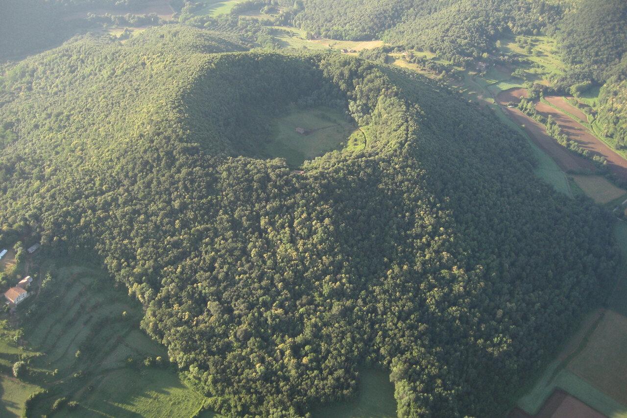 Aerial view into the wooded crater of Santa Margarida volcano in La Garrotxa
